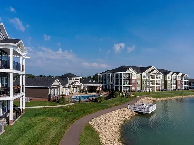 Modern multifamily apartment building illustrating consistent income and growth potential from multifamily syndication returns.