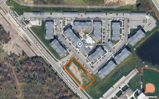 View of Nese Apartments and proposed location of gas station